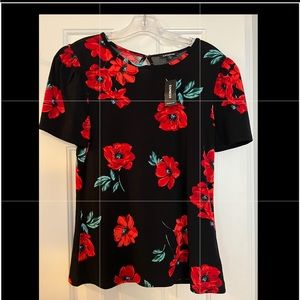 Black top with floral detail